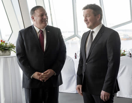 U.S. Secretary of State Michael Pompeo listens to Icelandic Minister of Foreign Affairs Gudlaugur Thor Thordarson in Reykjavik, Iceland February 15, 2019. REUTERS/Geirix