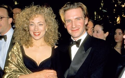Fiennes at a 1994 Oscars party with then-wife Alex Kingston - Credit: getty