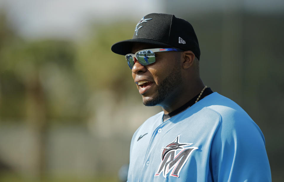 Miami Marlins first baseman Jesus Aguilar (24) looks on during the spring training workout at Roger Dean Stadium on Thursday, February 20, 2020 in Jupiter, Fla. (David Santiago/Miami Herald via AP)