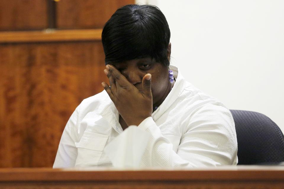 Ursula Ward, mother of Odin Lloyd, wipes her eyes after looking at a photograph from the medical examiner's office of her dead son during the murder trial of former New England Patriots tight end Aaron Hernandez at Bristol County Superior Court in Fall River, Massachusetts February 4, 2015. Hernandez is accused of the murder of semi-professional football player Lloyd in 2013. REUTERS/Brian Snyder (UNITED STATES - Tags: CRIME LAW SPORT FOOTBALL)