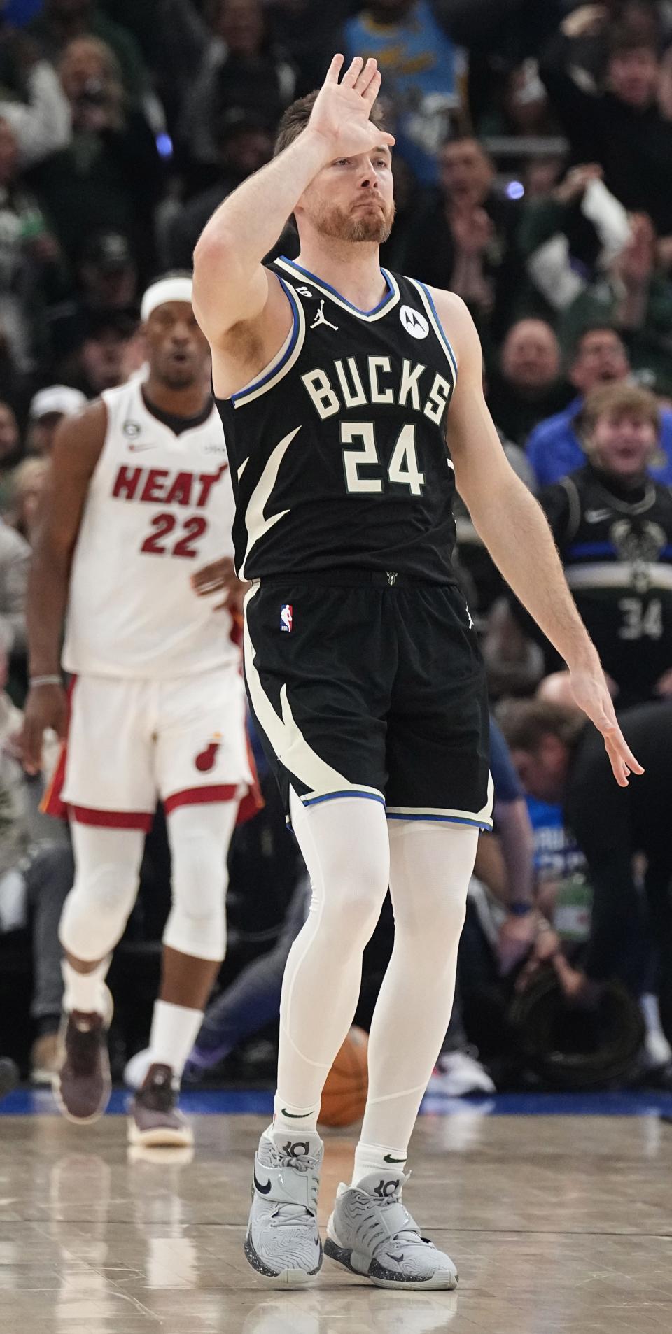 Milwaukee Bucks guard Pat Connaughton reacts after hitting a three-point basket against the Miami Heat on Wednesday.