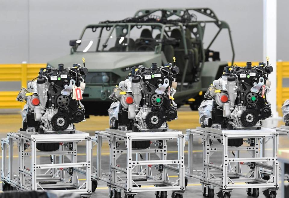 Engines are placed along the assembly line of the new Infantry Squad Vehicle.