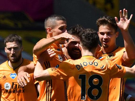 Wolves players celebrate scoring against Everton (Getty Images)