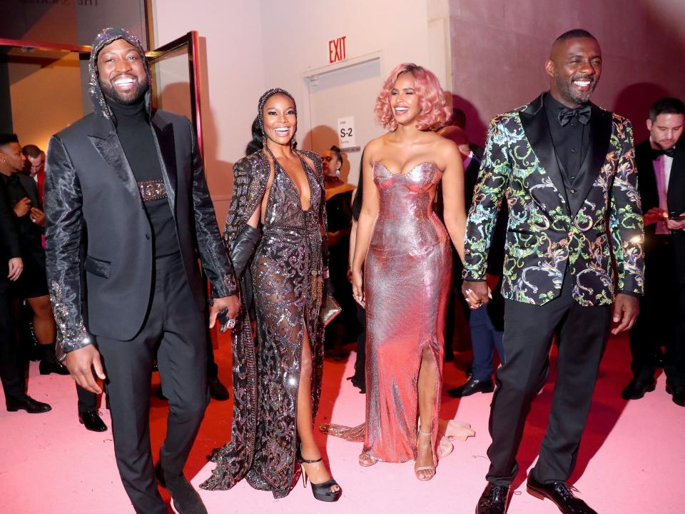 Dwayne Wade, Gabrielle Union, Sabrina Dhowre, and Idris Elba at the 2019 Met Gala.