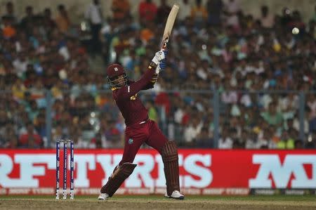 Cricket - England v West Indies - World Twenty20 cricket tournament final - Kolkata, India - 03/04/2016. West Indies Marlon Samuels plays a shot. REUTERS/Adnan Abidi