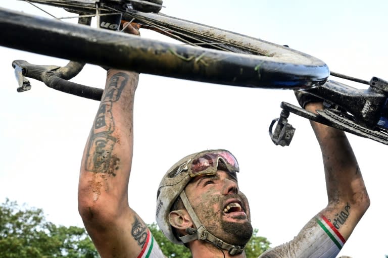 Sonny Colbrelli splatterd with mud after winning Paris-Roubaix in 2021 (Bernard PAPON)