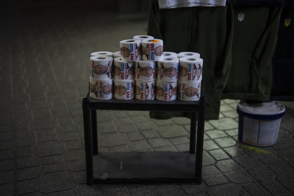 Toilet paper rolls featuring Putin's face are sold at a shop in Kyiv, Ukraine, Monday, Jan. 30, 2023. (AP Photo/Daniel Cole)