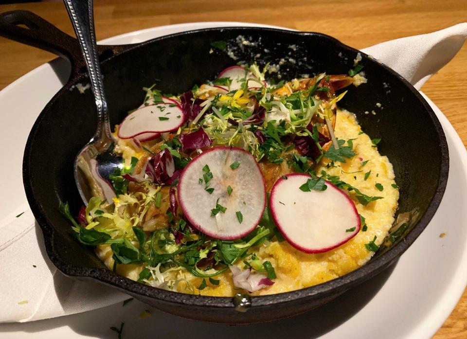 The wild Mexican shrimp "scampi" at Campo features grilled shrimp in a creamy polenta with tomato and basil.