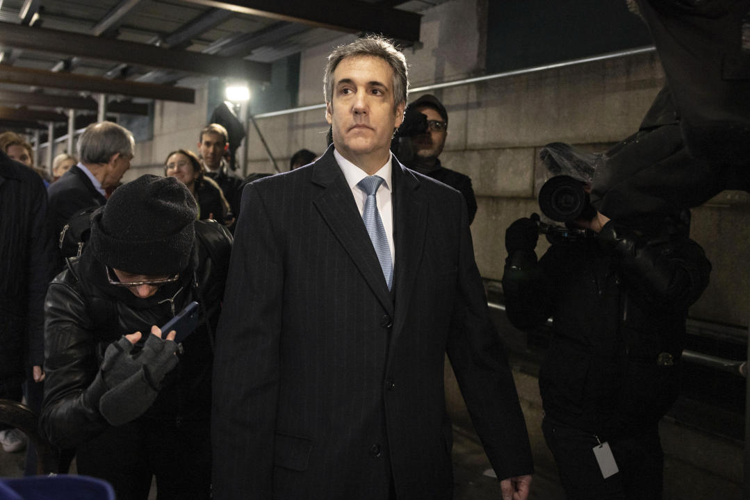 Michael Cohen leaves the district attorneys office in New York.
