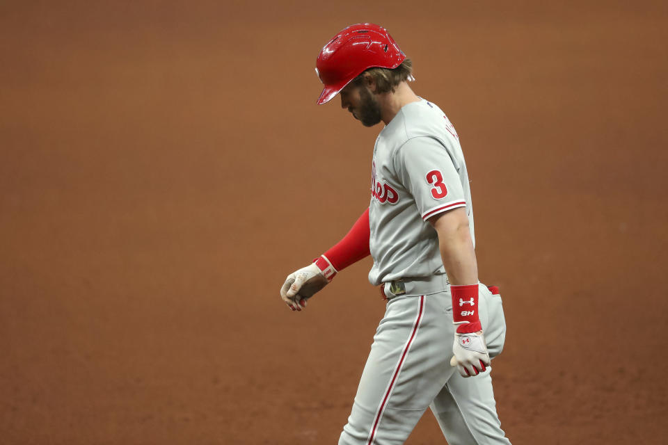 Philadelphia Phillies' Bryce Harper reacts after grounding out against the Tampa Bay Rays during the eighth inning of a baseball game Sunday, Sept. 27, 2020, in St. Petersburg, Fla. (AP Photo/Mike Carlson)