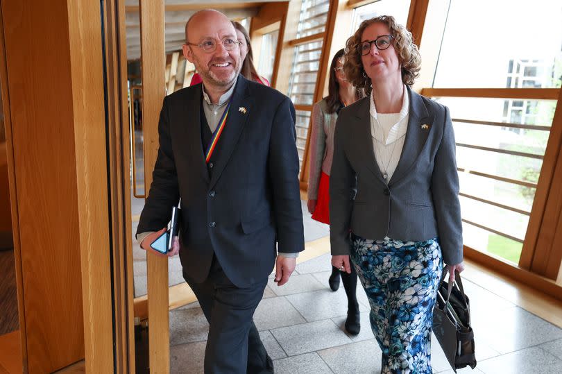 Scottish Green Party co-leaders Patrick Harvie (C) and Lorna Slater (R)