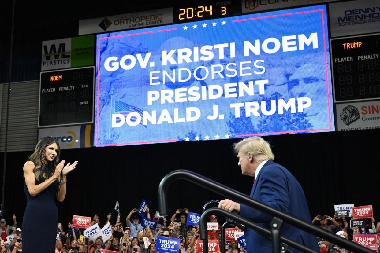 Kristi Noem welcomes Donald Trump to a political rally