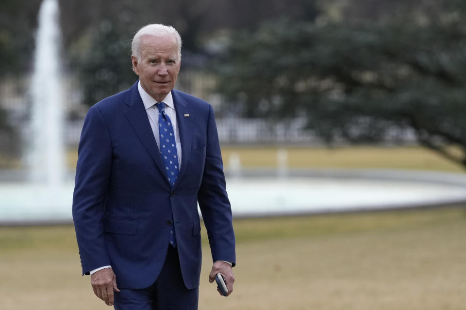 President Joe Biden walks over to talk with reporters outside White House in Washington, Wednesday, Jan. 4, 2023. Biden was returning from a trip to Kentucky to visit a notoriously dilapidated bridge connecting Ohio and Kentucky to promote his administration's infrastructure law. (AP Photo/Susan Walsh)