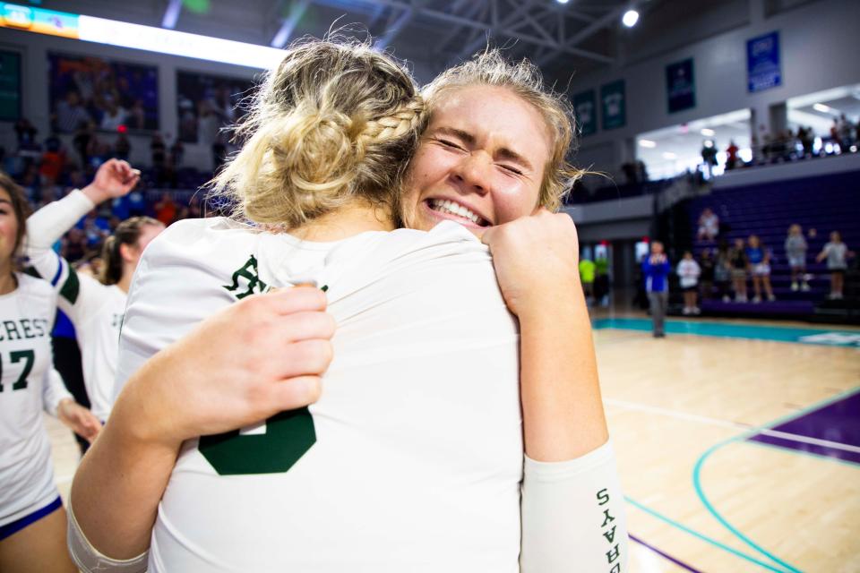 Seacrest Country Day School's Carole Ann Hussey (21) and Seacrest Country Day School's Breanah Rives (6) hug after the team wins the Class 2A State Championship volleyball match between Seacrest Country Day and Lake Worth Christian on Wednesday, Nov. 17, 2021 at the Suncoast Credit Union Arena in Fort Myers, Fla. 