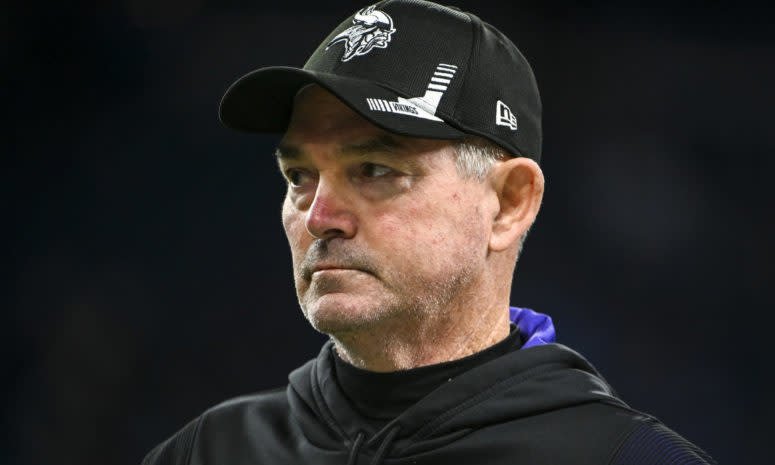 Vikings head coach Mike Zimmer looks on.