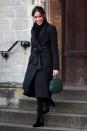<p>For a striking all black ensemble in Cardiff, Markle chose a tie front mid-length coat by Stella McCartney.</p>