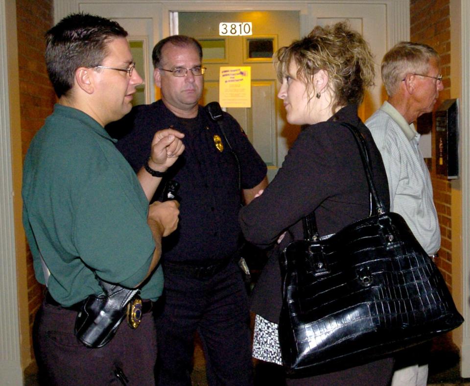 Then-Assistant District Attorney Elizabeth Hirz is pictured in this file photo with then-Erie Police detectives (from left) Lt. Dan Spizarny, Lt. Kenneth Merchant at an Erie crime scene in August 2007. Hirz, who was appointed as Erie County district attorney in 2022, is running unopposed for the office on Nov. 7.