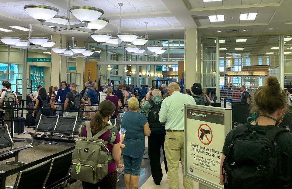 A zig-zagging line for the security checkpoint at Asheville Regional Airport on June 15.