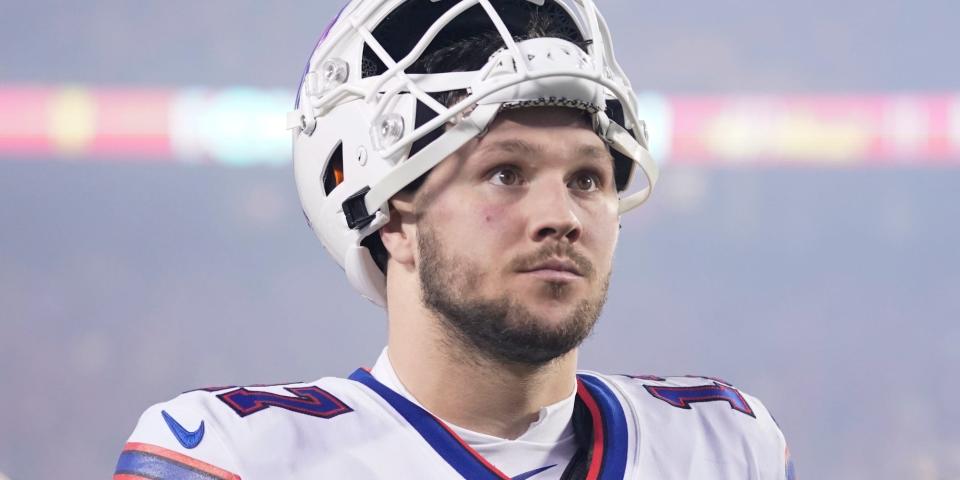 Josh Allen looks up during a playoff game against the Chiefs in 2022.