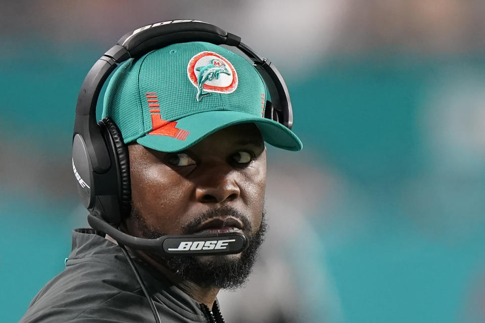 FILE - Miami Dolphins head coach Brian Flores during the second half of an NFL football game against the New England Patriots, Sunday, Jan. 9, 2022, in Miami Gardens, Fla. Fired Miami Dolphins Coach Brian Flores sued the NFL and three of its teams Tuesday, Feb. 1, 2022 saying racist hiring practices by the league have left it racially segregated and managed like a plantation. (AP Photo/Wilfredo Lee, File)