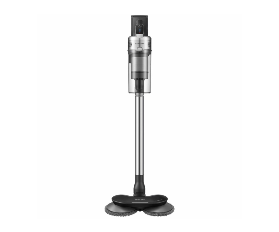 The Samsung silver cordless Stick Vaccum with Spinning Sweeper Tool against a white background.