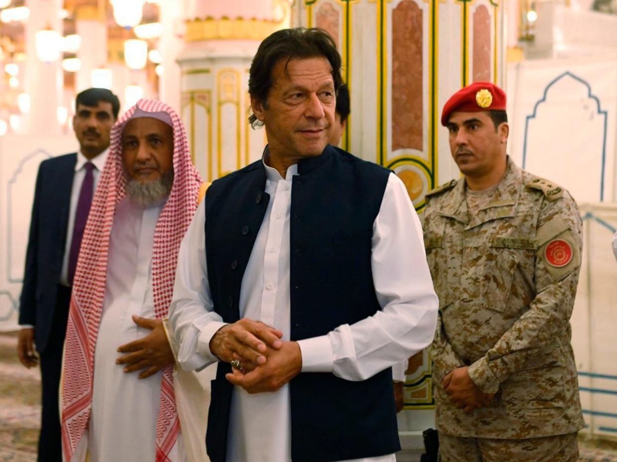 Imran Khan visits the Prophet's Mosque in Medina, Saudi Arabia, during his first overseas trip since taking office: AP