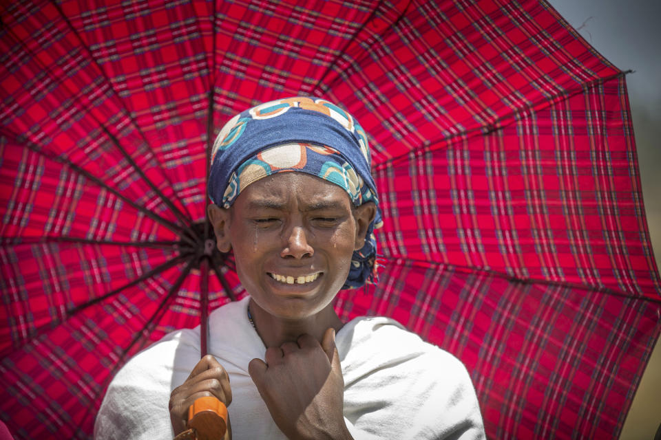 A family member reacts at the scene where the Ethiopian Airlines Boeing 737 Max 8 plane crashed shortly after takeoff on Sunday killing all 157 on board, near Bishoftu, south of Addis Ababa, in Ethiopia, March 13, 2019. (Photo: Mulugeta Ayene/AP)