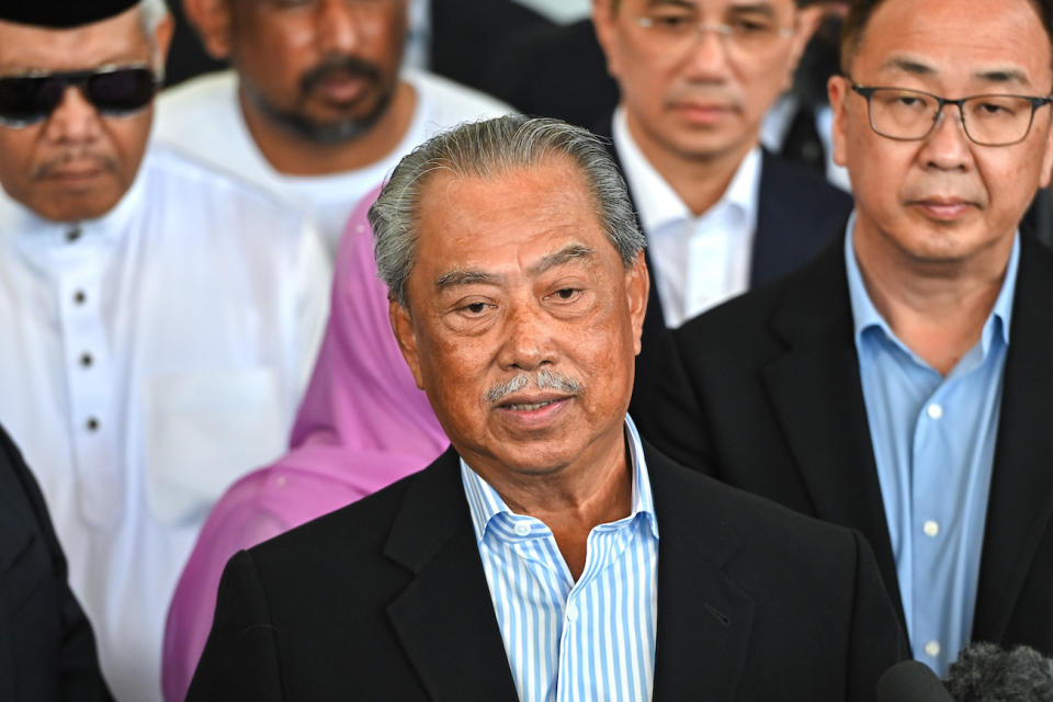 Former Malaysian Prime Minister Muhyiddin Yassin speaks to media outside a courthouse in Kuala Lumpur, Malaysia, on 10 March 2023. Acquitted by the high court of four corruption charges on 15 August, shortly after his opposition bloc gained ground in local elections.