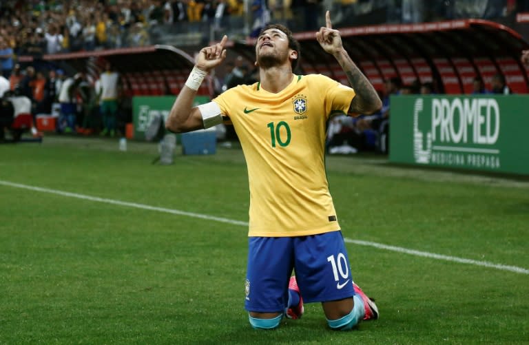 Brazil's Neymar celebrates after scoring against Paraguay during their Russia 2018 World Cup qualifier match, in Sao Paulo, on March 28, 2017