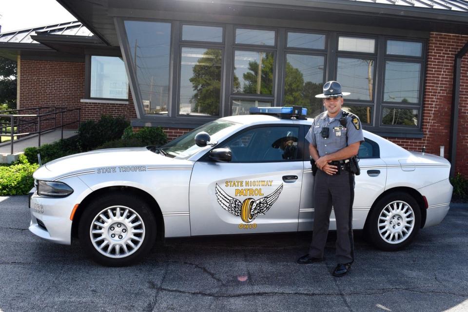 Although the Ohio Highway Patrol is often associated with road patrol, Trooper Joshua Smith said OHP offers a vast variety of career opportunities, including investigators and aircraft pilots. He said people interested in OHP careers are welcome to stop by their local post to inquire about career information and ride-alongs with state troopers. Here, he stands with his patrol car at the Fremont Patrol Post on the US 20 bypass.