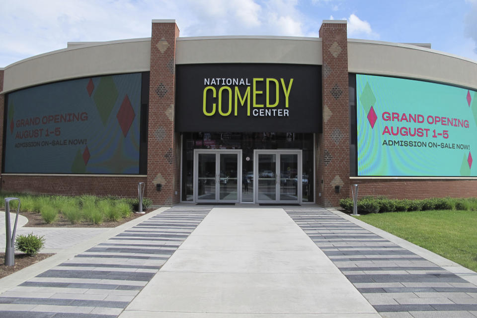 FILE - This July 24, 2018, file photo shows the main entrance to the National Comedy Center in Jamestown, N.Y. The center is open for laughs in “I Love Lucy” comedian Lucille Ball’s hometown. Amy Schumer, Lewis Black and Dan Aykroyd are among comedians set to appear during this week’s grand opening celebration. (AP Photo/Carolyn Thompson, File)