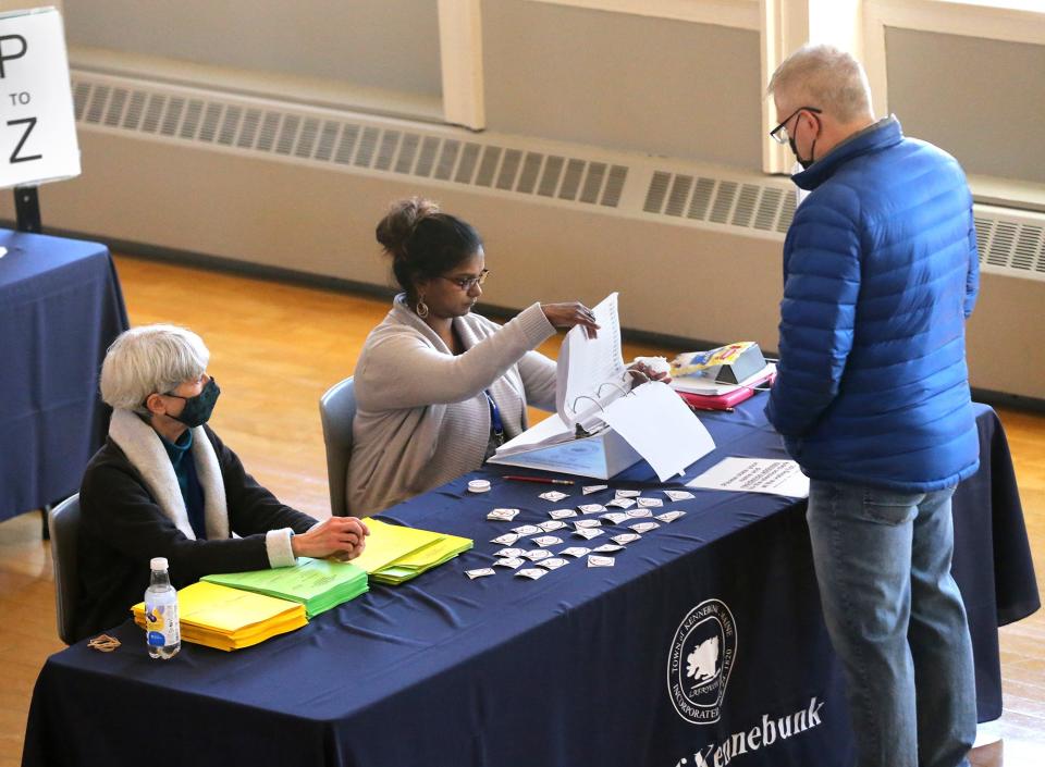 A voter reports to the polls at the Kennebunk Town Hall during a special recall election involving an RSU 21 School Board member in March of 2022.