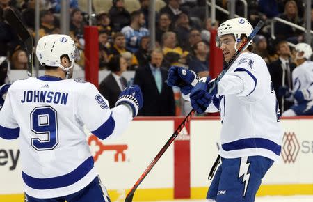 Nov 15, 2018; Pittsburgh, PA, USA; Tampa Bay Lightning center Tyler Johnson (9) congratulates center Brayden Point (21) after Point scoried a goal against the Pittsburgh Penguins during the first period at PPG PAINTS Arena. Charles LeClaire-USA TODAY Sports