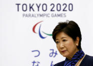 Tokyo governor Yuriko Koike listens to President of the International Olympic Committee Thomas Bach speaking at Tokyo Metropolitan Government Building in Tokyo, Japan, October 18, 2016. REUTERS/Kim Kyung-Hoon