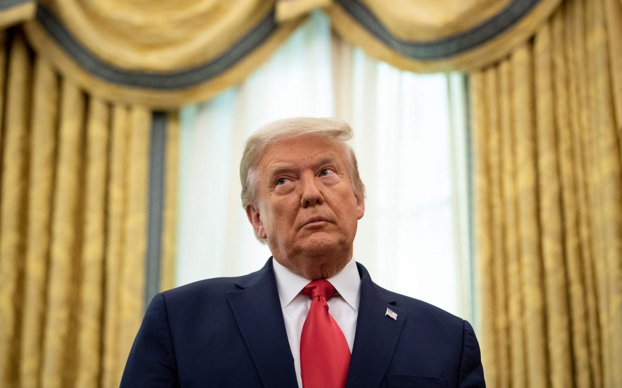 US President Donald Trump in the Oval Office of the White House - BRENDAN SMIALOWSKI/AFP