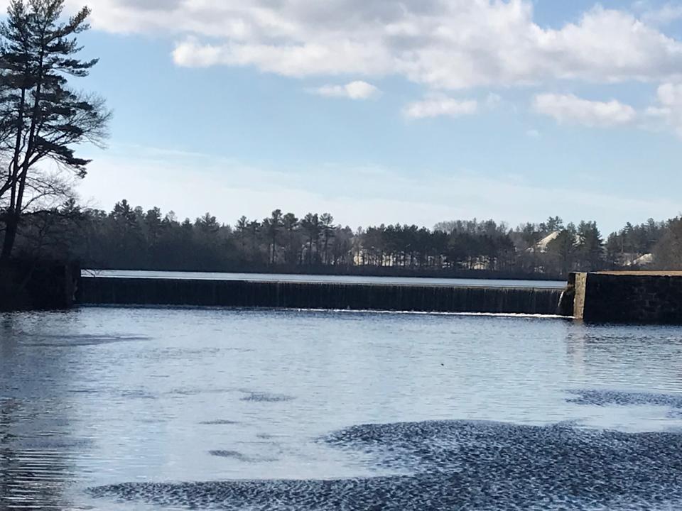 The Branch River tumbles over a 300-foot dam, one of several that were built to supply water that powered downriver mills.