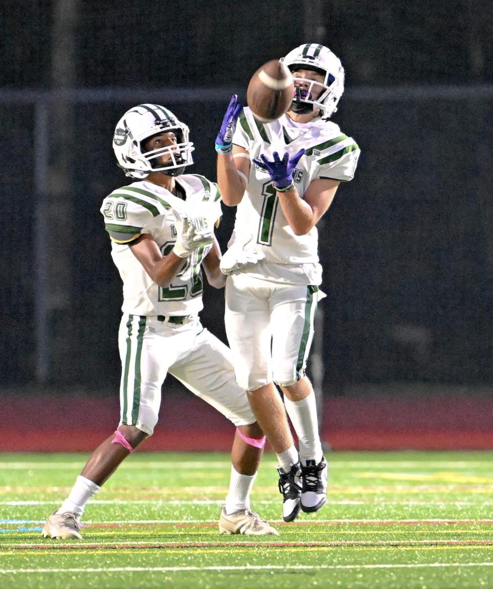 Peyton Kellett of D-Y takes a Mashpee kickoff backed up by Aidan Medeiros.