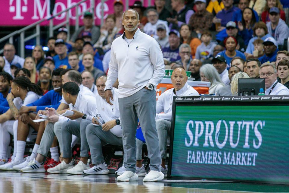 Kansas basketball acting coach Norm Roberts looks on during the first half of a Big 12 Conference tournament game Thursday against West Virginia at T-Mobile Center in Kansas City.