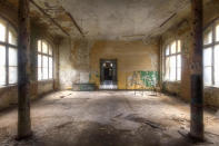 <p>An interior view of the rooms of an abandoned hospital which treated Adolf Hitler. (Roman Robroek/Caters News)</p>