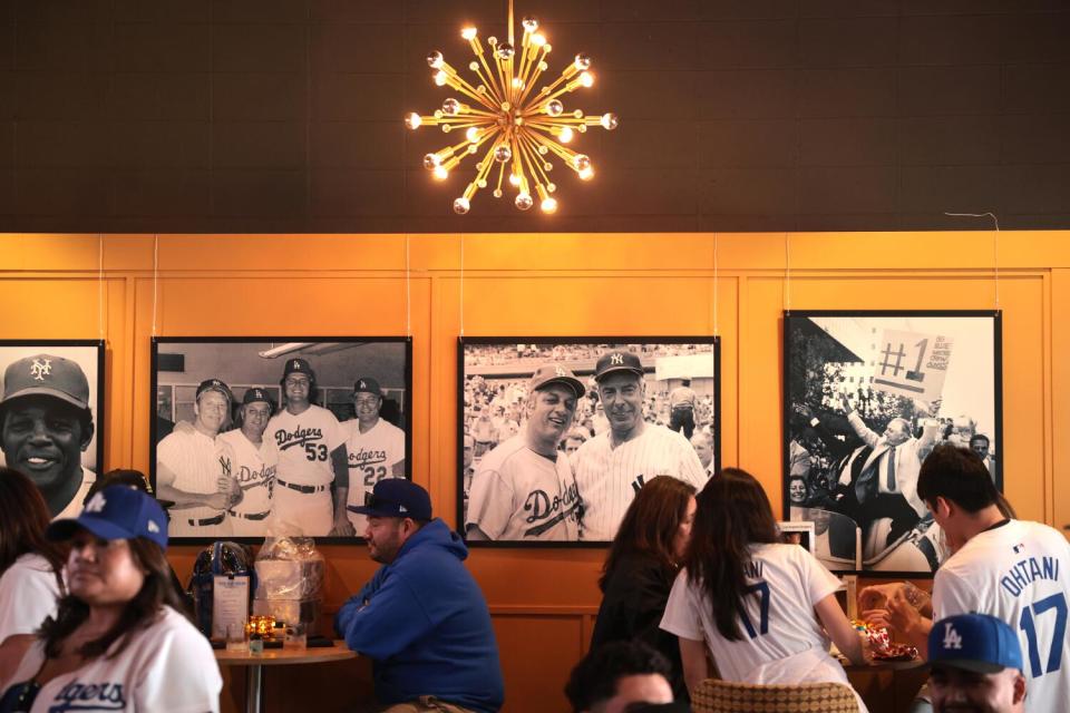 Classic photos hang on the walls at the speakeasy under the right field Pavilion at Dodger Stadium.