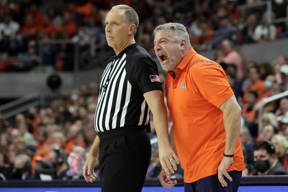 Auburn head coach Bruce Pearl reacts after a call during the first half of an NCAA college basketball game against Kentucky Saturday, Jan. 22, 2022, in Auburn, Ala. (AP Photo/Butch Dill)