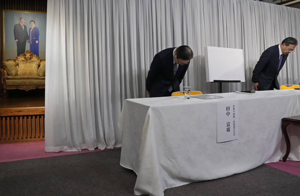 Tomihiro Tanaka, President of Family Federation for World Peace and Unification, and its senior member Hideyuki Teshigawara bow at the start of a press conference Tuesday, Nov. 7, 2023, in Tokyo. The church has criticized the Japanese government’s request for a court order to dissolve the group, saying it’s based on groundless accusations and is a serious threat to religious freedom and human rights of its followers. Japan’s Education Ministry last month asked the Tokyo District Court to revoke the legal status of the Unification Church after a ministry investigation concluded the group for decades has systematically manipulated its followers into donating money, sowing fear and harming their families.(AP Photo/Shuji Kajiyama)