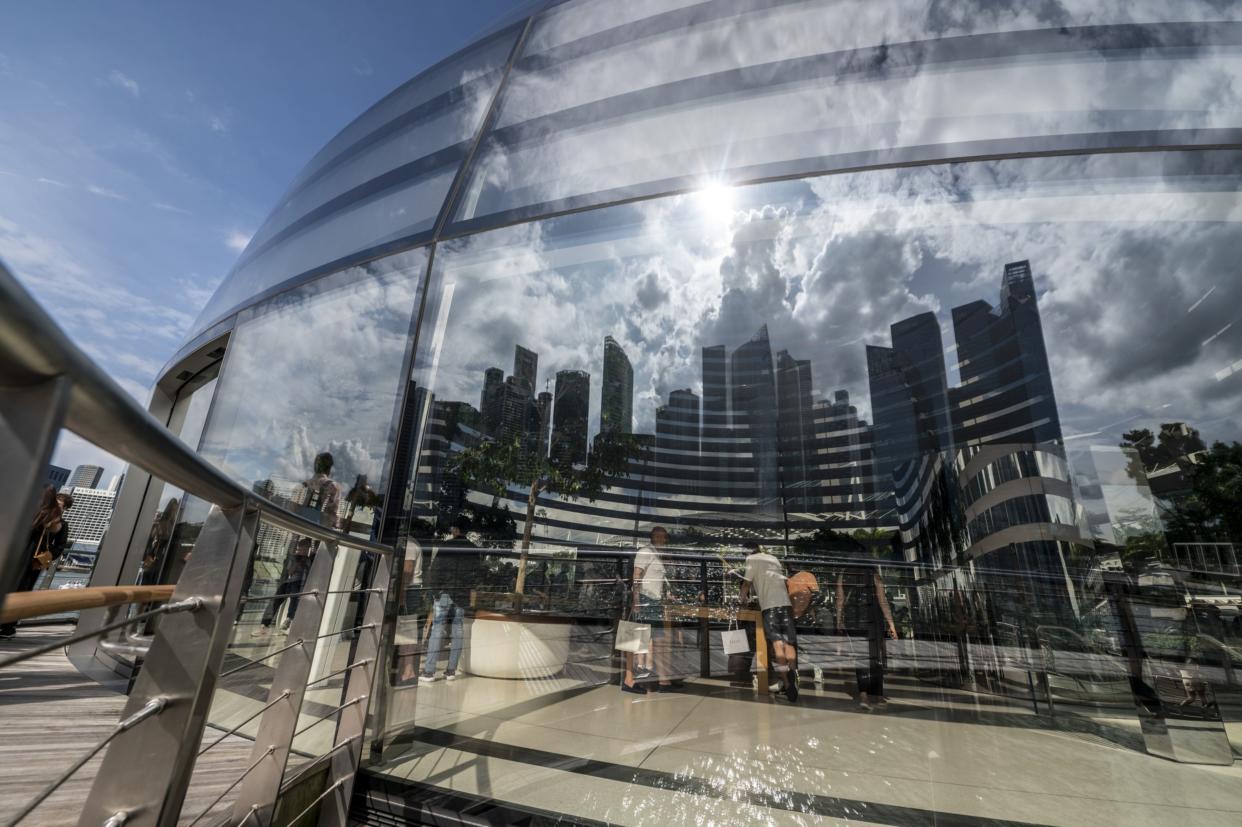 An Apple Inc. store at the Marina Bay Sands waterfront promenade in Singapore, on Saturday, Feb. 11, 2023.  Photographer: Edwin Koo/Bloomberg