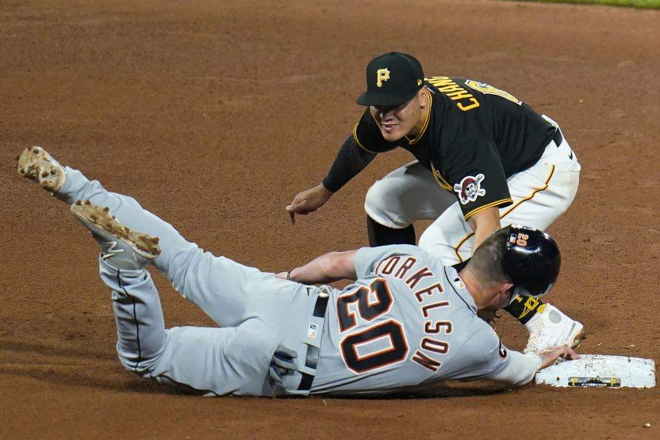 Detroit Tigers' Spencer Torkelson (20) is tagged out by Pittsburgh Pirates second baseman Yu Chang on a ball hit by Daz Cameron during the eighth inning of a baseball game in Pittsburgh, Tuesday, June 7, 2022. (AP Photo/Gene J. Puskar)