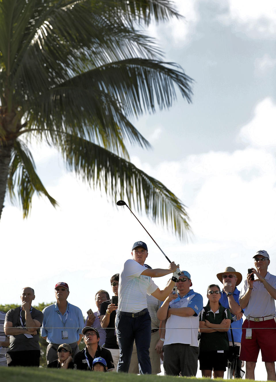 Jordan Spieth hits from the 14th tee during the first round of the Sony Open PGA Tour golf event, Thursday, Jan. 10, 2019, at the Waialae Country Club in Honolulu, Hawaii. (AP Photo/Matt York)