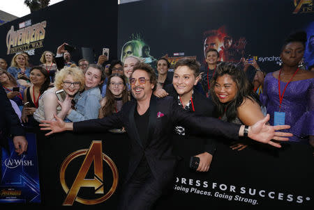 Premiere of “Avengers: Infinity Wars” - Arrivals - Los Angeles, California, U.S., 23/04/2018 - Actor Robert Downey Jr. poses with fans. REUTERS/Mario Anzuoni