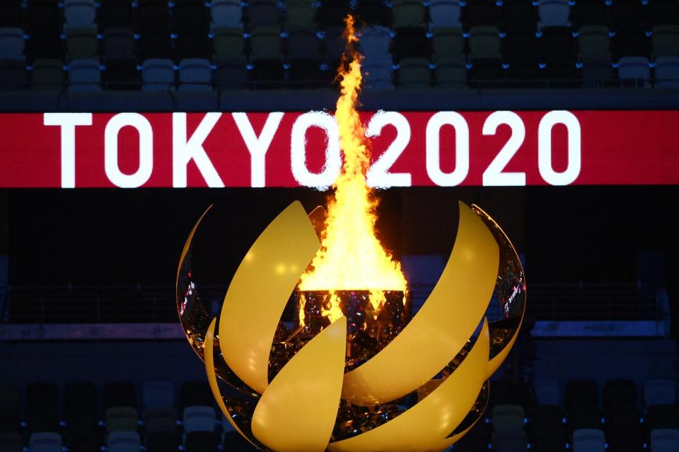 The Olympic Flame burns after the lighting of the Olympic Cauldron during the opening ceremony