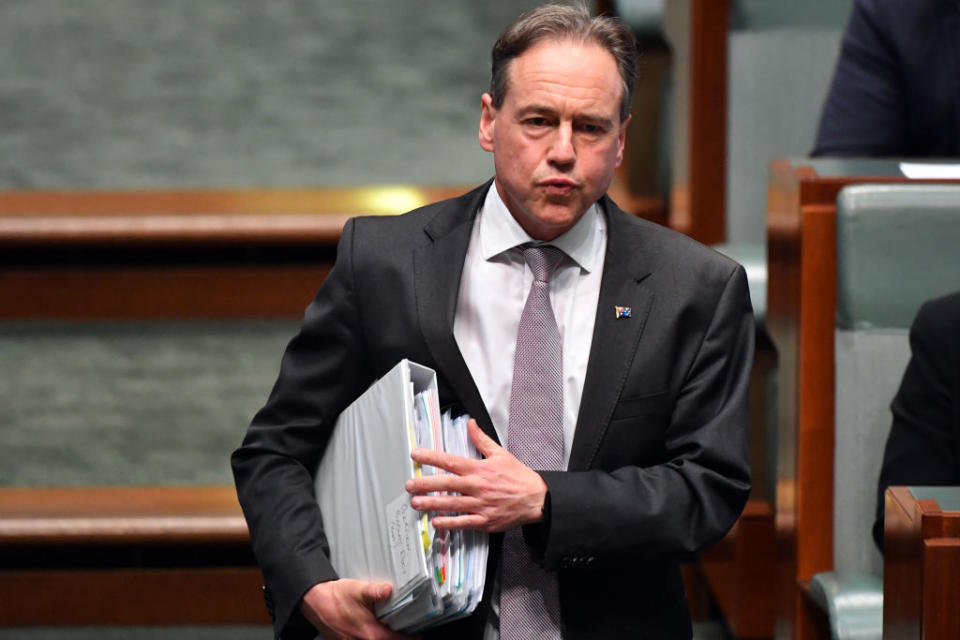 Minister for Health Greg Hunt gestures during Question Time in the House of Representatives at Parliament House in Canberra, Australia. 