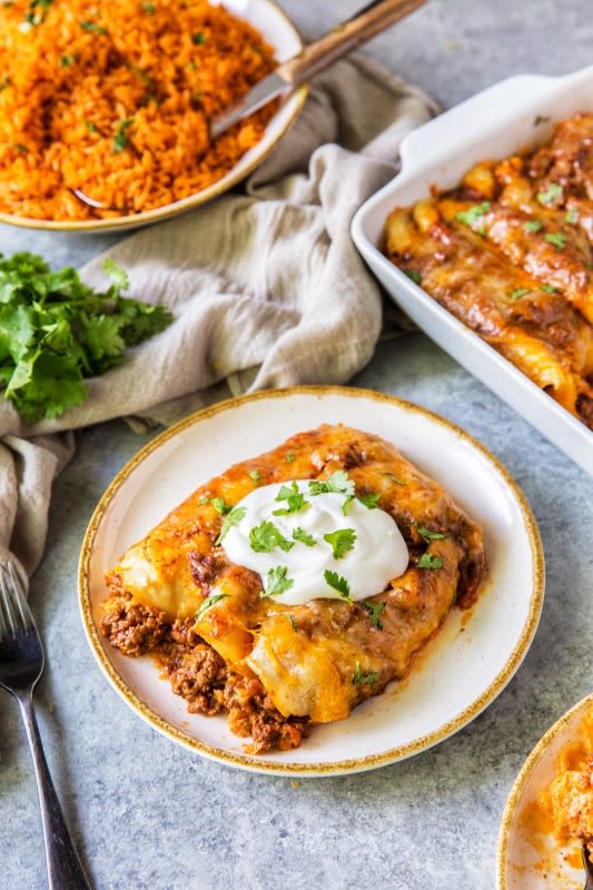 <p>Number 2 Pencil</p><p>Corn tortillas filled with flavorful ground beef, melty cheese and a killer homemade red enchilada sauce.</p><p><strong>Get the recipe: <a href="https://www.number-2-pencil.com/beef-enchiladas-recipe/" rel="nofollow noopener" target="_blank" data-ylk="slk:Cheesy Ground Beef Enchiladas;elm:context_link;itc:0;sec:content-canvas" class="link ">Cheesy Ground Beef Enchiladas</a></strong></p><p><strong>Related: <a href="https://www.yahoo.com/lifestyle/150-ground-beef-recipes-dinner-133027676.html" data-ylk="slk:150+ Ground Beef Recipes;elm:context_link;itc:0;sec:content-canvas;outcm:mb_qualified_link;_E:mb_qualified_link;ct:story;" class="link  yahoo-link">150+ Ground Beef Recipes</a></strong></p>