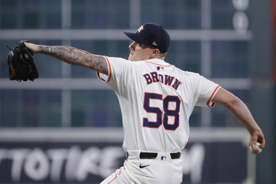 Houston Astros starting pitcher Hunter Brown throws during the first inning of a baseball game against the Los Angeles Angels, Wednesday, May 22, 2024, in Houston. (AP Photo/Michael Wyke)